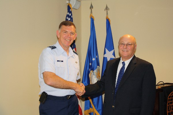 Mitch Able, chapter president, thanks Maj. Gen. Wallace Farris, USAF, commander of the 22nd Air Force, for his keynote address at the chapter's first meeting at Dobbins Air Reserve Base in April.